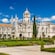 Guests walking through the gardens of Jerónimos Monastery in Lisbon, Portugal